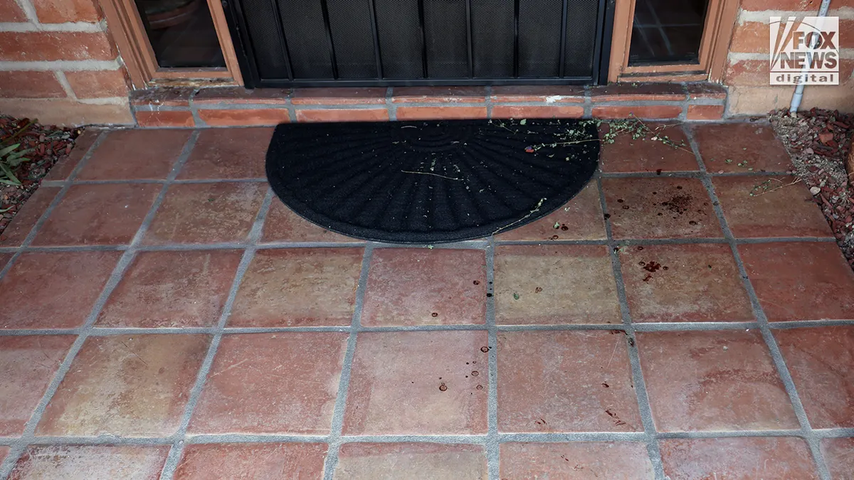 Blood observed on Nancy's front porch.