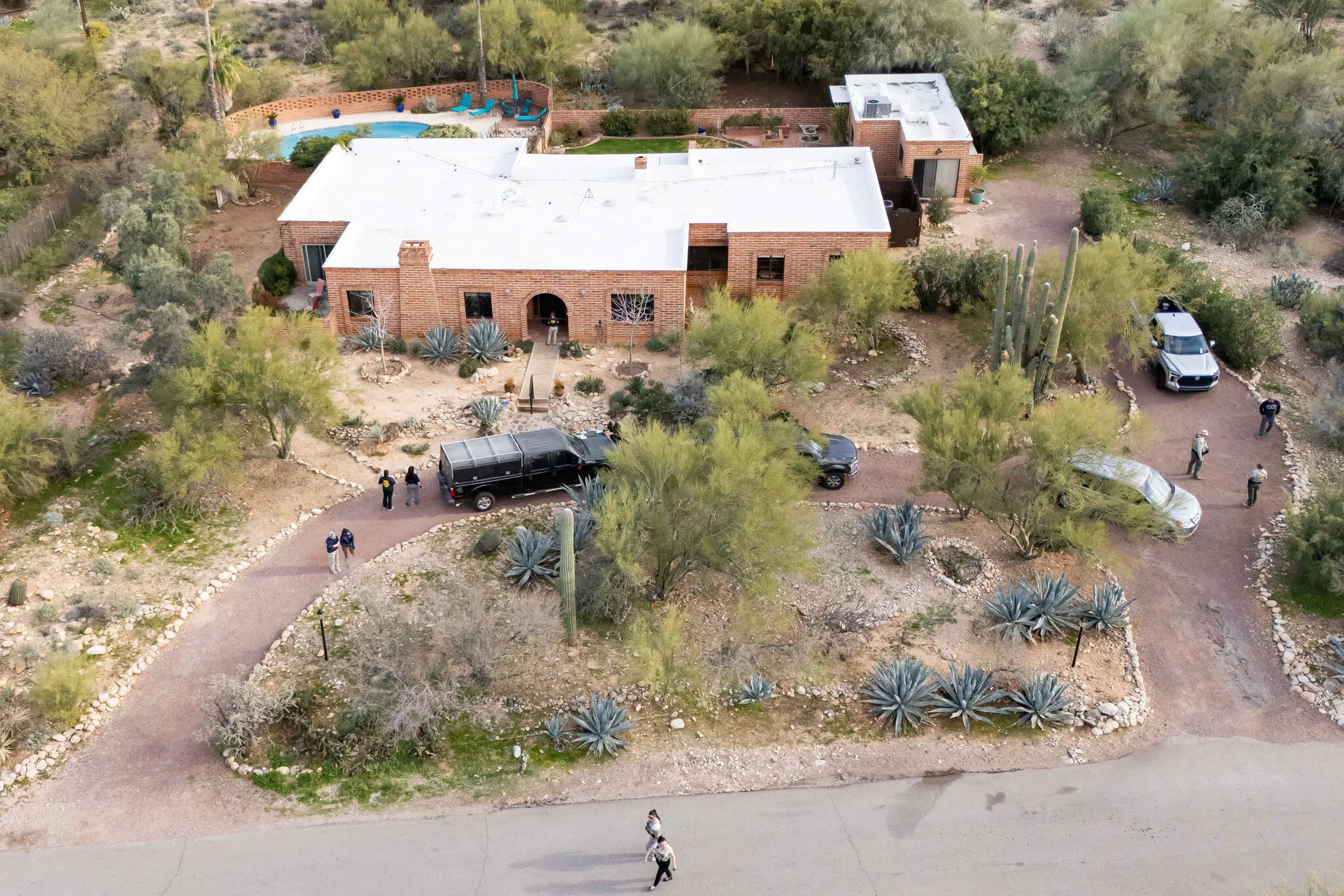 Suspect approaching Nancy's front door