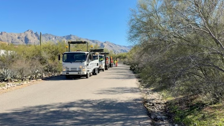 Work crews pick up trash.