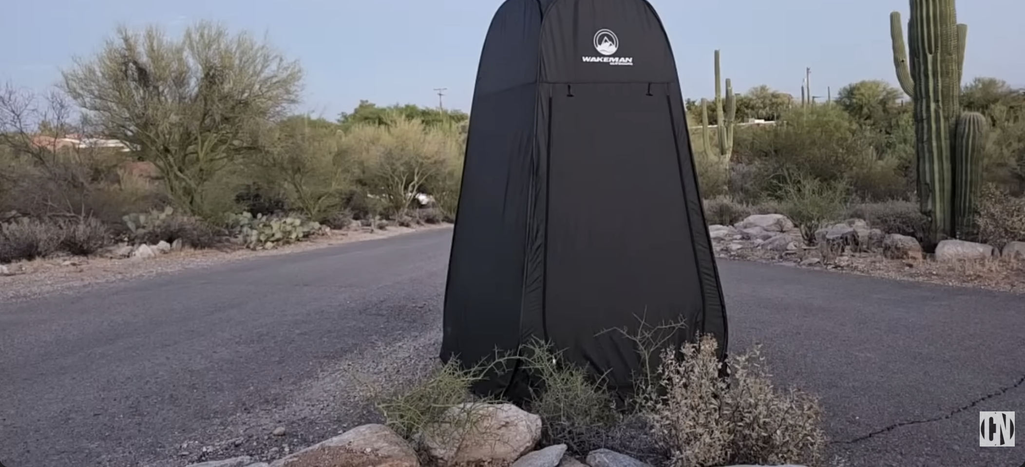 Car drives by when Zabel is in his pee tent.