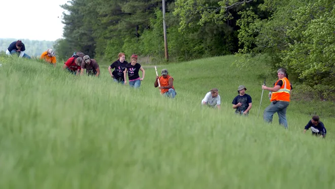 Searchers combing the area near the Bobo home